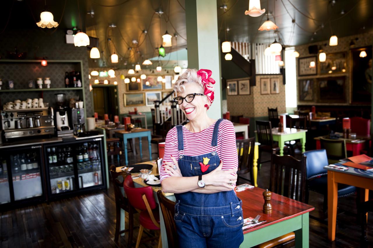 Server standing in a restaurant