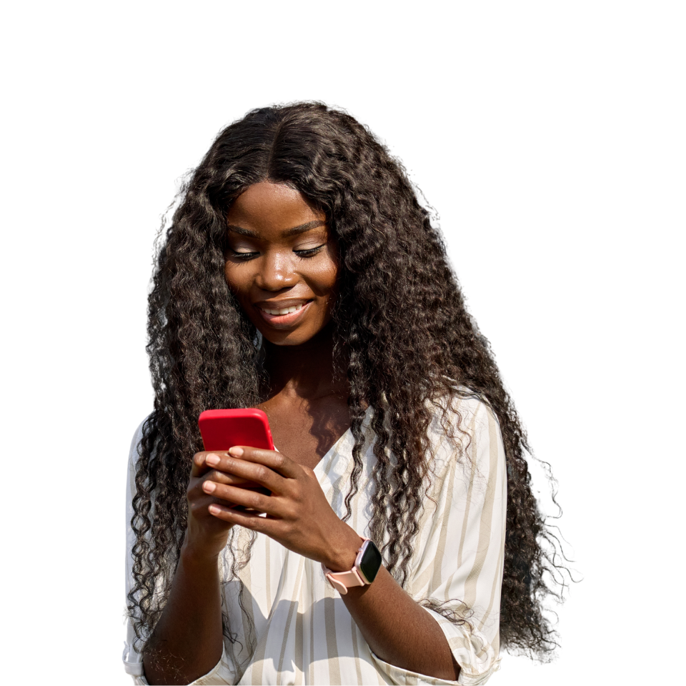 Young woman looks happily at her smartphone