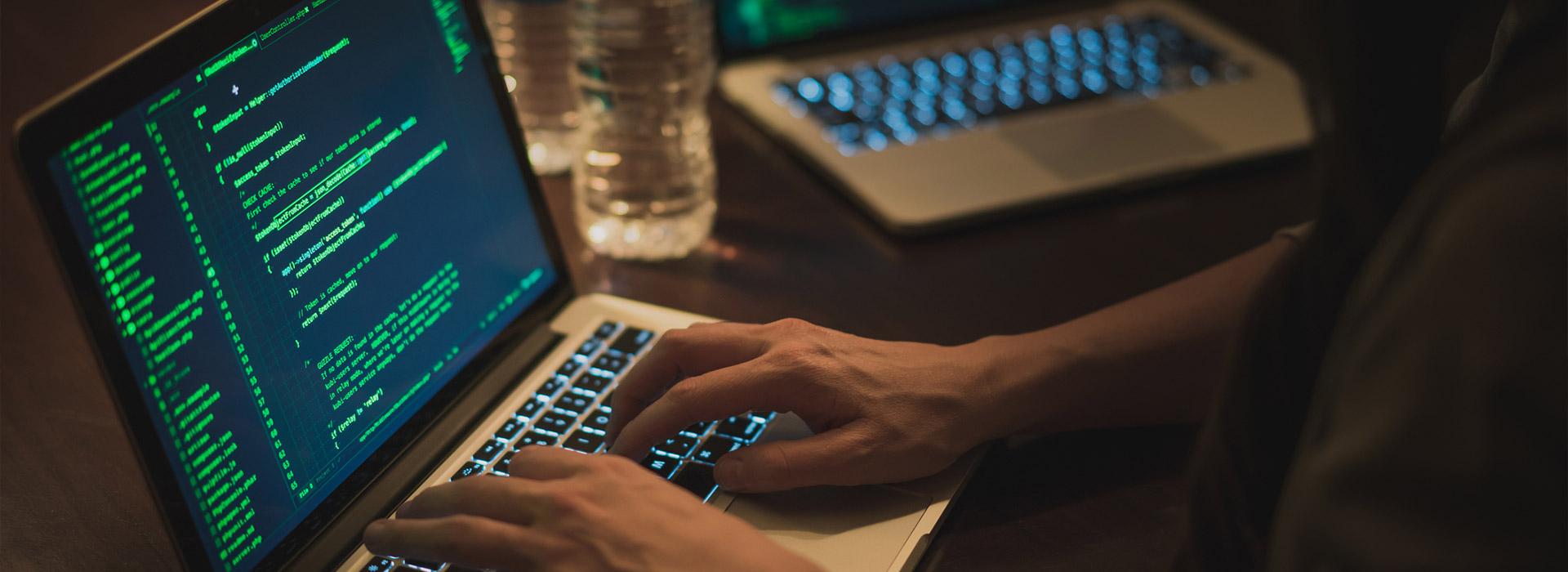 bad actor hacking a computer